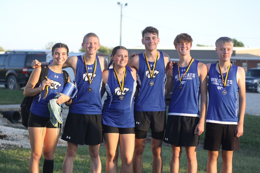 Katlyn Kolling, Brendan Craven, Maddie West, Beckham Cothren, Cooper Sellenriek and Jacob Roesner of Montgomery County pose with their medals at the Wellsville-Middletown Invitational.