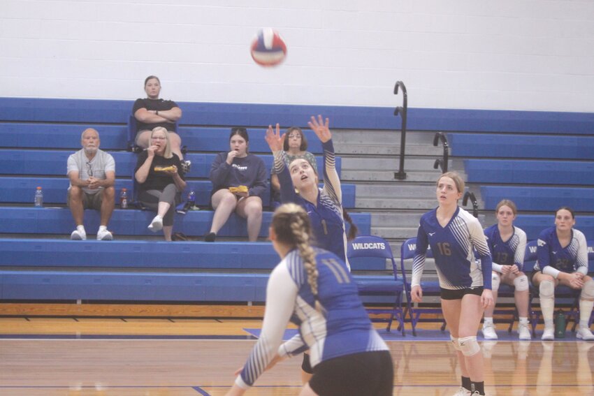 Montgomery County sophomore Aubrey Janes sets the ball in the first game against Wright City on Sept. 26 at Ballew & Snell Court. MCHS defeated Wright City in four games.