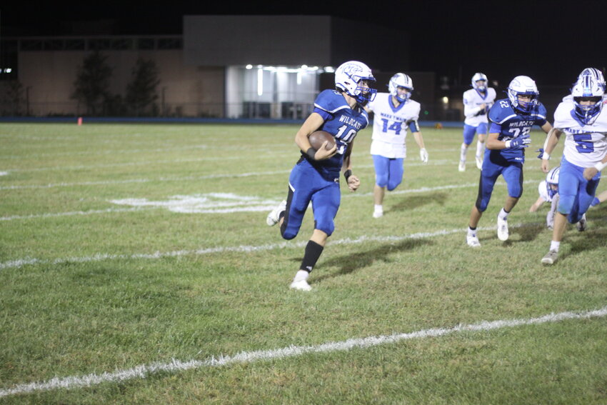 Montgomery County senior Jacob Hogue goes for a carry against Mark Twain on Oct. 4 at Jim Blacklock Field. Hogue is part of a senior class that also includes Trenton Birkner, Jordan Hicks, Bryson Nichols and Tatum Wessel.