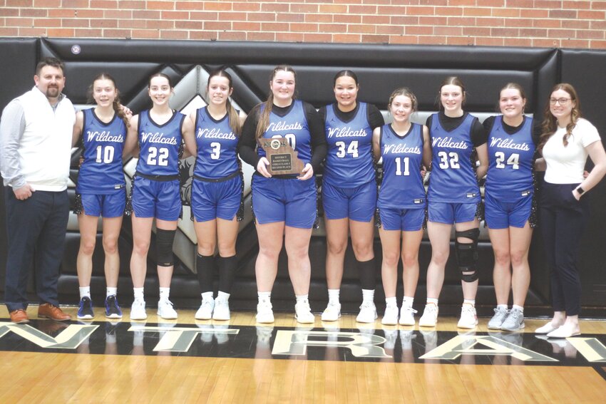 The Montgomery County girls basketball team poses with its second-place district plaque after losing to Centralia 64-19 in the Class 3, District 7 championship game on March 1 at Centralia.