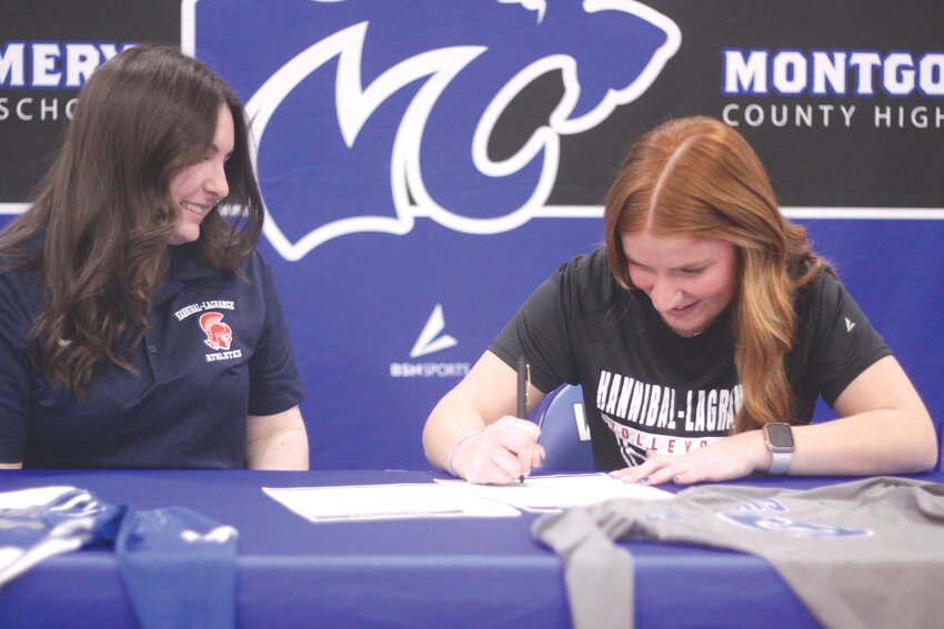 Montgomery County senior Ava Rakers signs a letter of intent to play volleyball at Hannibal-LaGrange on March 4 at the MCHS gymnasium. On the left is Hannibal-LaGrange graduate assistant coach Frannie Harris.