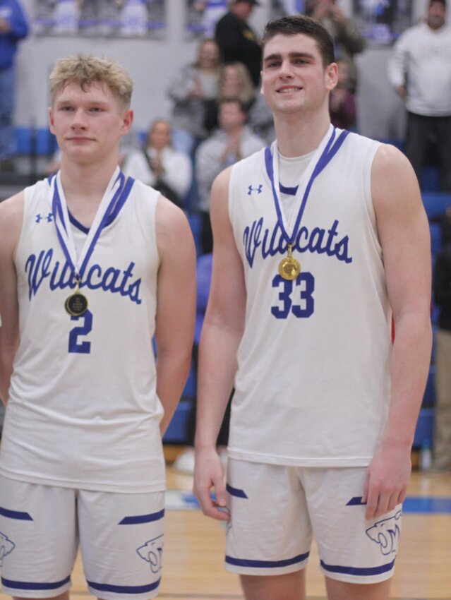 Montgomery County seniors Andrew Moore and Clayton Parker pose while receiving all-tournament honors at the Hermann Tournament in January. Both were the Wildcats’ representatives on the MBCA Class 3 all-state team this year.