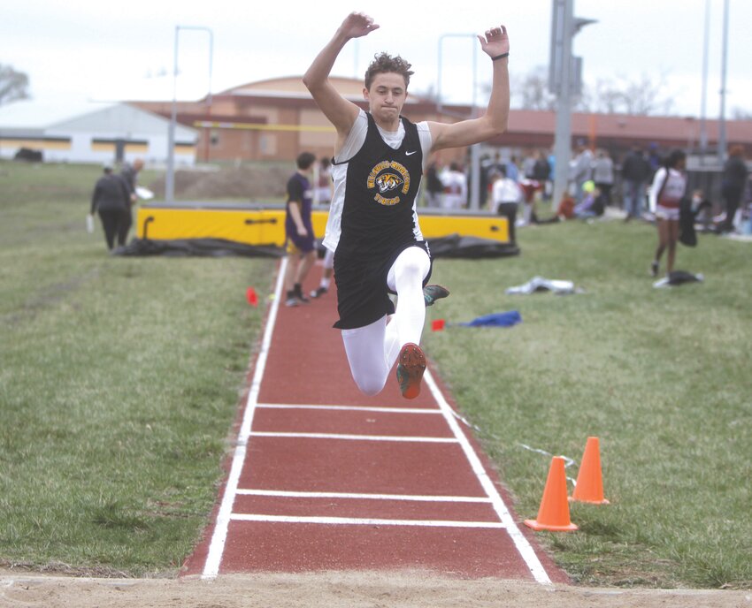 Wellsville-Middletown senior Gage Marshall competes in the long jump at the Van-Far Open Meet on March 24.