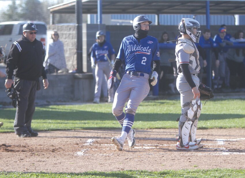 Montgomery County senior Jacob Hogue crosses the plate in the bottom of the first inning against Warrenton on April 7. Hogue is back with the Wildcats this season after hitting over .300 and picking up an all-district award last spring.