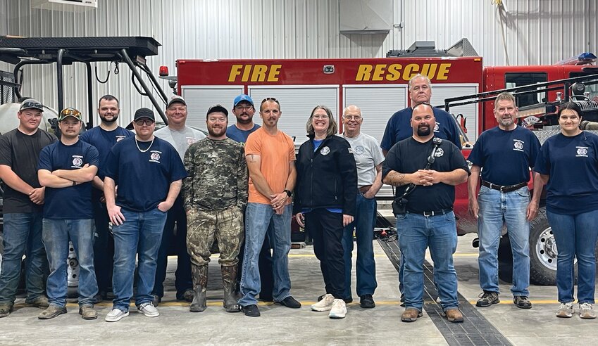 Members of the Montgomery Fire Protection District pose during an event on April 29. The fire department is celebrating its 25th anniversary this year.