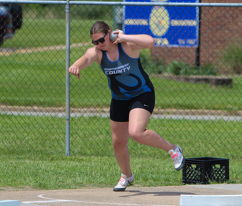 Montgomery County sophomore Samantha Turner wins district titles in the shot put and discus at the Class 3, District 3 championship meet on May 10 in Owensville.