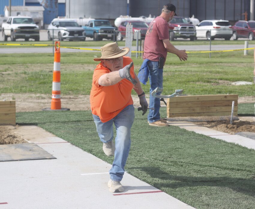 Don Gillette of Wentzville throws a horseshoe at the new horseshoe pit at Stiers Memorial Park in Rhineland.