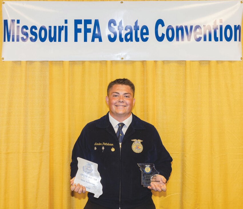 Recent Montgomery County graduate Landon Pottebaum poses with his state championship in grain production at the Missouri FFA Convention in April. He and Alexa Groeber will represent MCHS in the Agricultural Proficiency Awards category at the FFA National Convention in October.