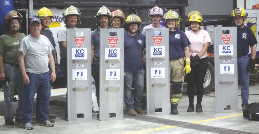 Members of the Montgomery Fire Protection District pose with their new grain bin rescue tubes the department applied for last winter. A training was held at the firehouse on June 3.