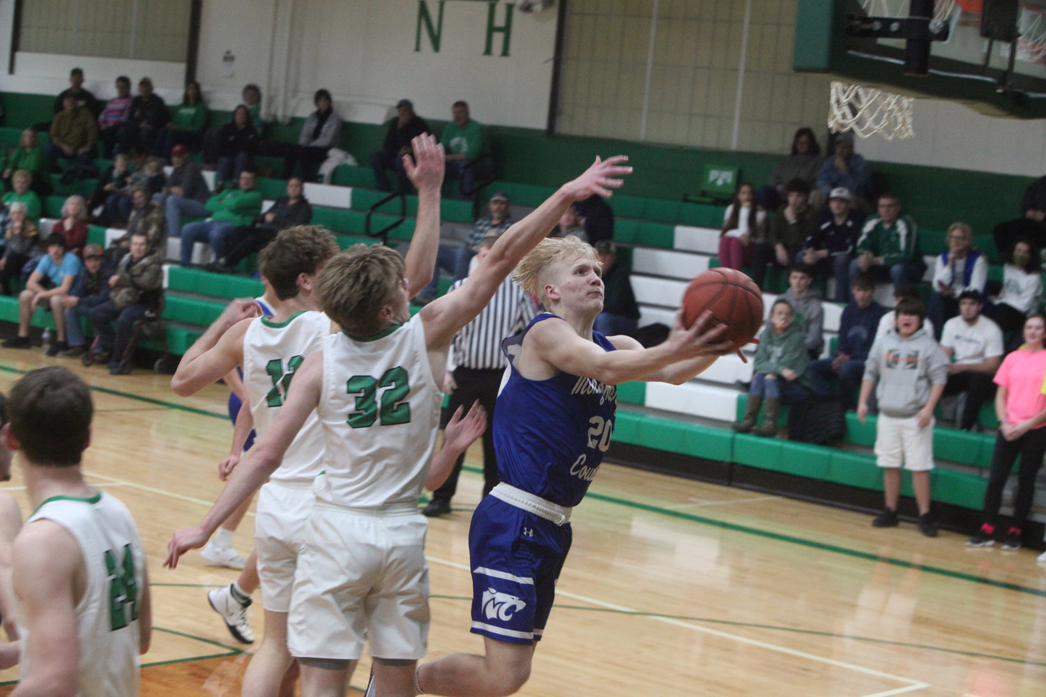 Montgomery County freshman Tyler Erwin goes for a shot in the first quarter against the New Haven Shamrocks on Jan. 7. Erwin and the Wildcats lost to New Haven 37-36.