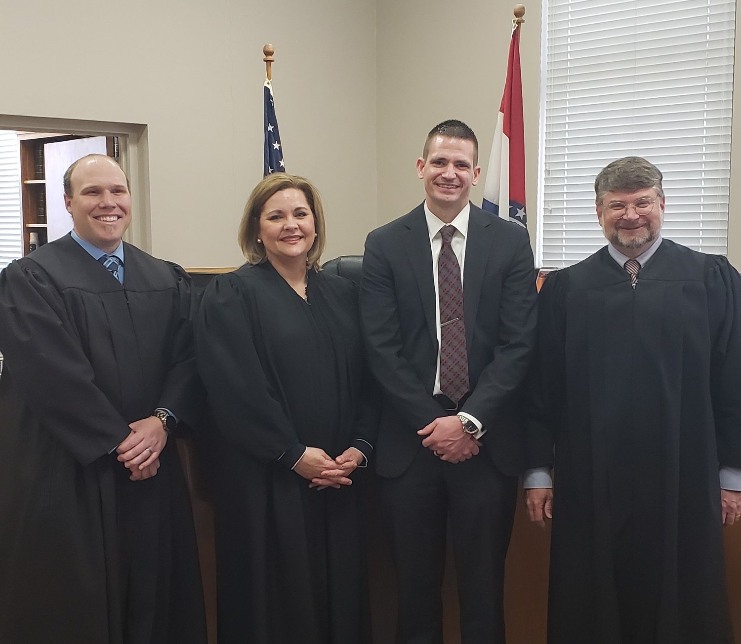 Wellsville-Middletown graduate Keith Freie was appointed as interim prosecuting attorney for Montgomery County during an oath ceremony on April 15. Pictured, from left, are Associate Circuit Judge Nathan Carroz, Judge Kelly Broniec of the Missouri Court of Appeals for the Eastern District, Freie and Circuit Judge Jason Lamb.