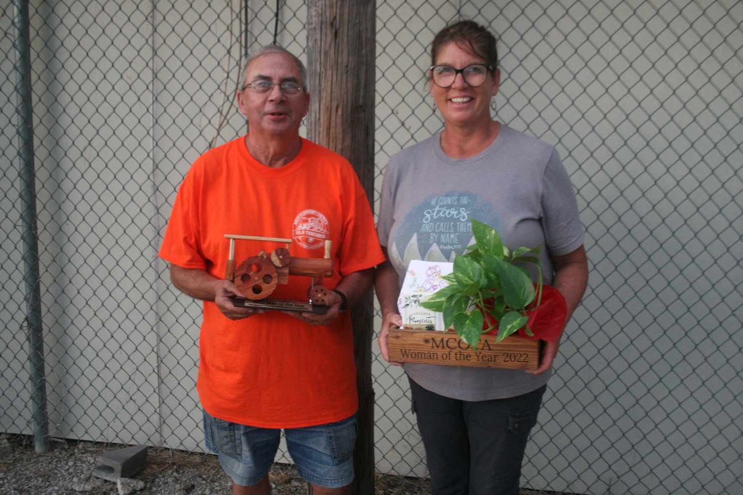 Victor Wiser and Julie Bote pose with their Old Threshers Man and Woman of the Year awards on Aug. 20 at the Montgomery County Fairgrounds.
