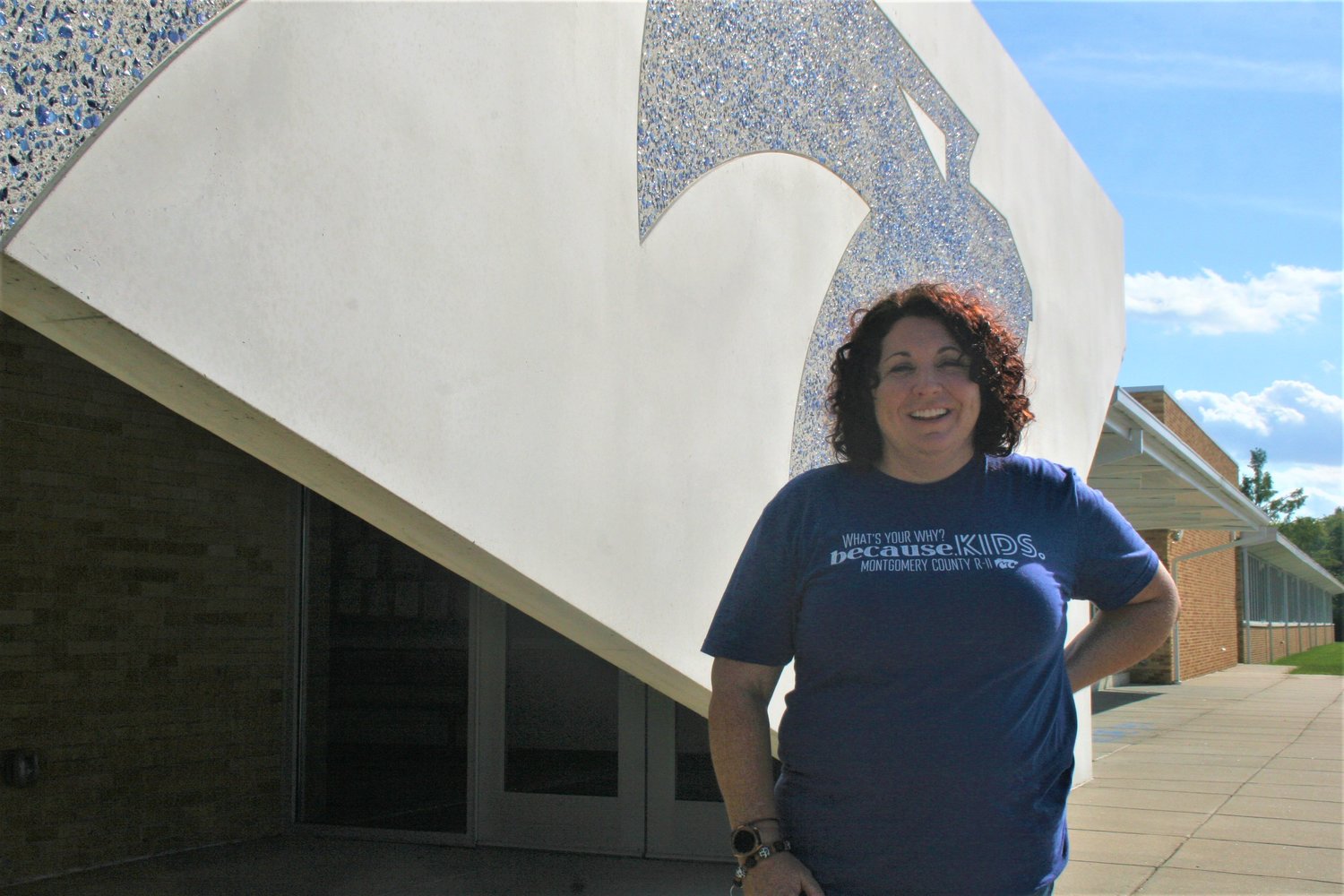 Jill Jacob poses in front of Montgomery City Elementary School on Aug. 26. She is in her first year as the school’s principal, replacing Jeania Burton.