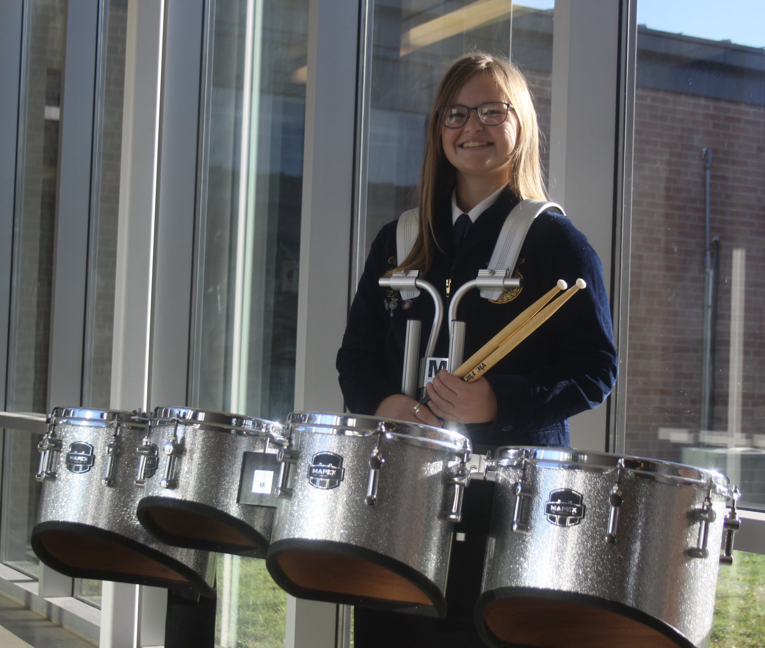 Montgomery County senior Cora Johnson poses with her drums at Montgomery County High School. She played for the National FFA band for the second year in a row at the National FFA Convention & Expo on Oct. 26-29 in Indianapolis.