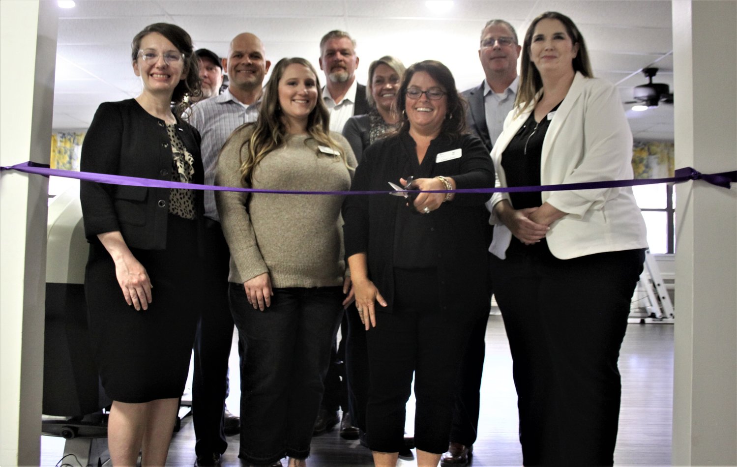 Amy Hill, executive director of St. Andrew’s at New Florence, cuts the ribbon on Nov. 10 to commemorate the new rehab center at the nursing home.