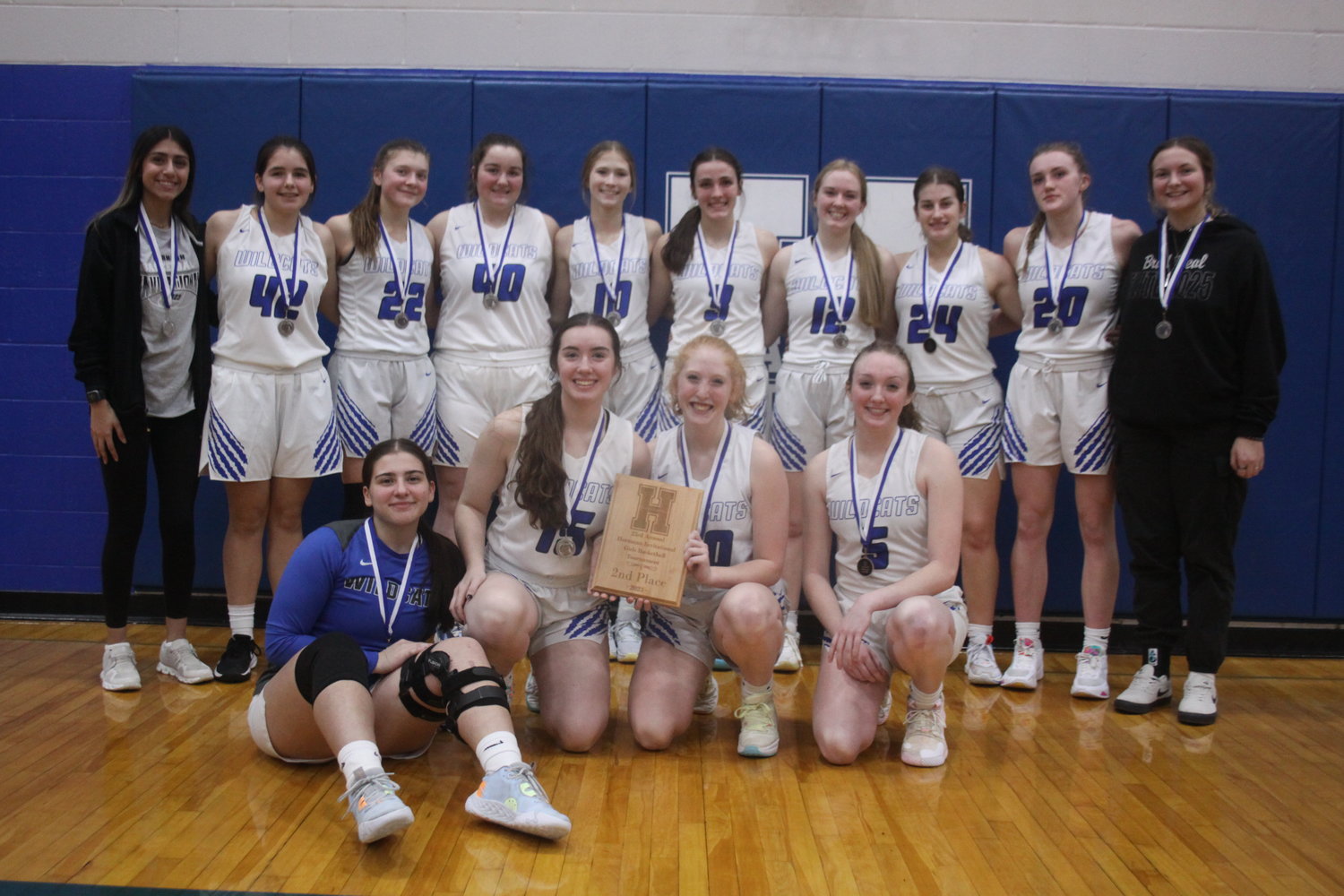 The Montgomery County girls basketball team poses with its second-place plaque after losing to Owensville 50-48 in the championship game of the Hermann Invitational Tournament on Jan. 27. Pictured, front row from left, are Carissa Doyle, Maddie Wisdom, Bailey Fischer and Carson Flake. Back row are Karla Gonzalez, Avery Leu, Malia Rodgers, Aliviah Fischer, Miley Rieke, Claire Cobb, Madi Polston, Maddy Queathem, Olivia Shaw and Atlanta Kobusch.