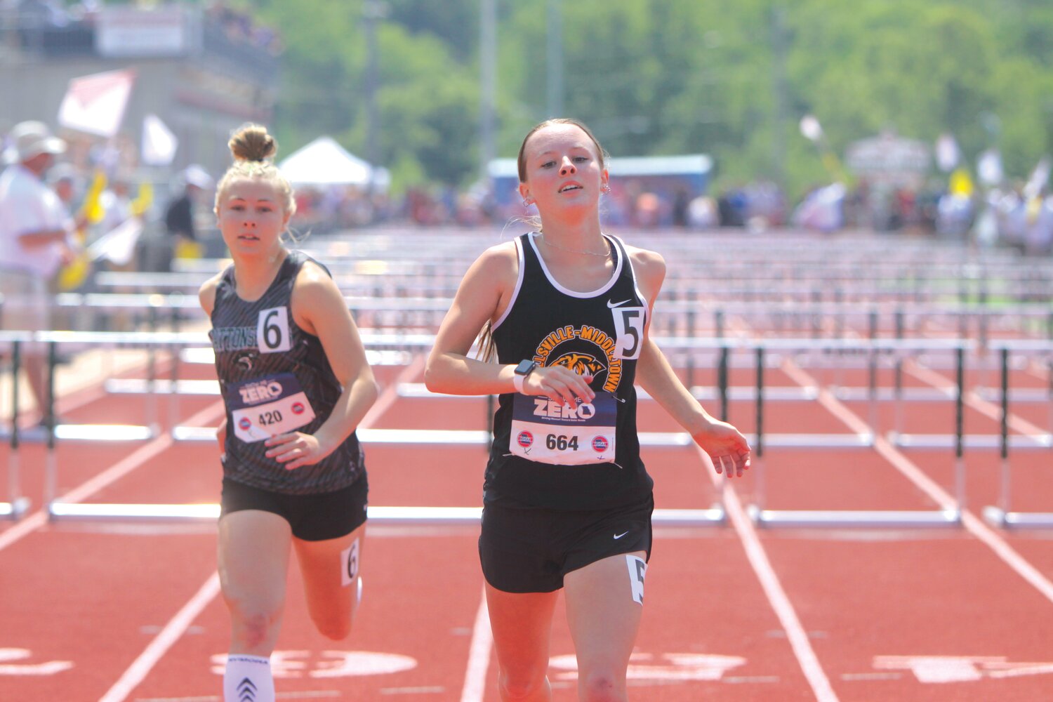 Wellsville-Middletown junior Bethany Slovensky crosses the finish line in the 100-meter hurdles finals at the Class 1 state meet on May 20 at Jefferson City. Slovensky earned three medals, finishing second in the 100-meter hurdles and long jump and placing fourth in the 300-meter hurdles.