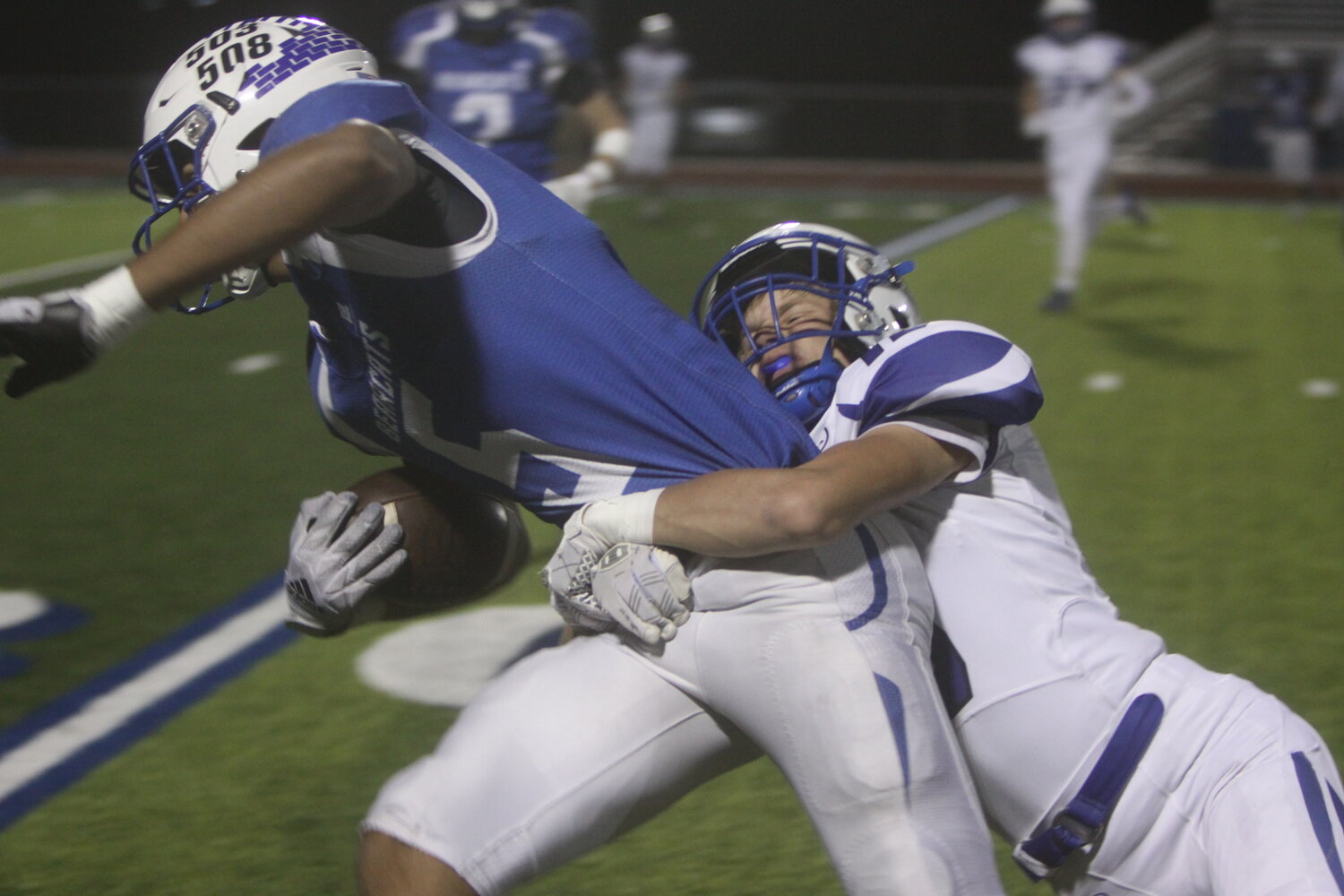 Montgomery County sophomore Chase Queathem, left, tackles Hermann’s Daeden Hopkins in the first quarter.