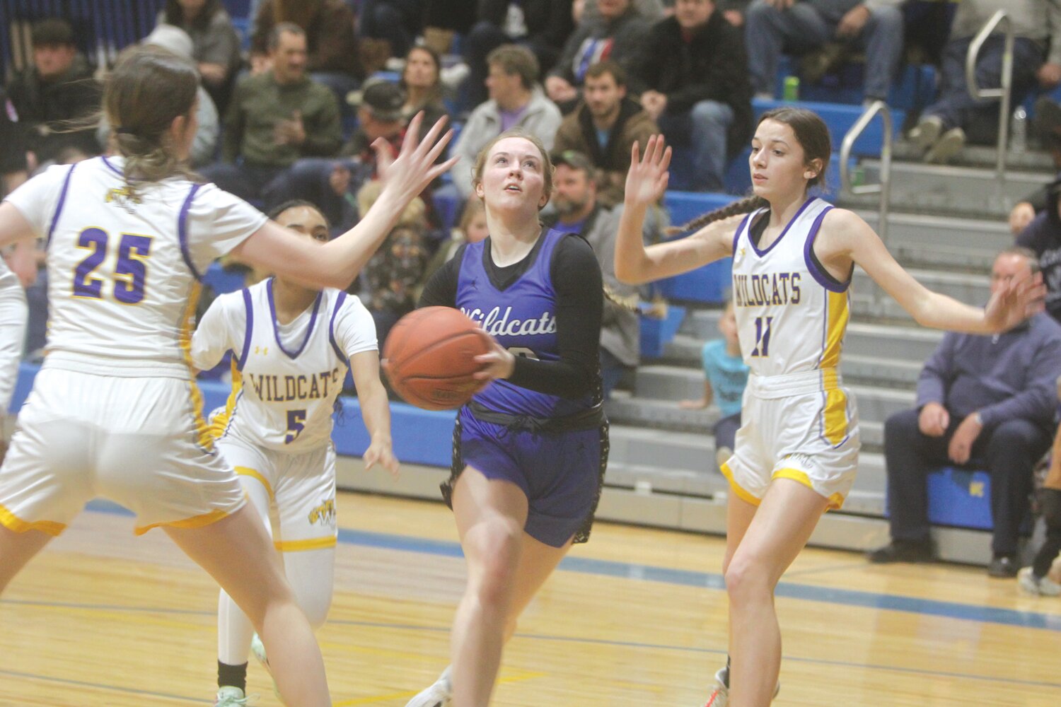 Montgomery County senior Madi Polston drives to the basket against Wright City on Jan. 18. She finished with 10 points to lead the Wildcats to an 82-24 win.