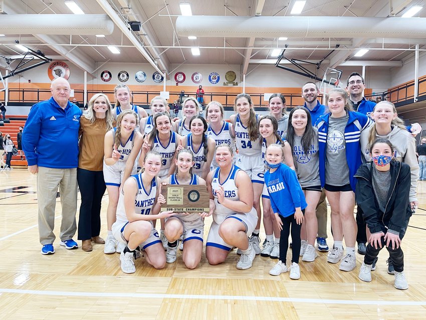 The St. Mary&rsquo;s-Colgan girls varsity team poses with their 2021 sub-state championship plague. Head Coach Abby Farabi was named the Sports in Kansas Class 2A Coach of the Year on Thursday.