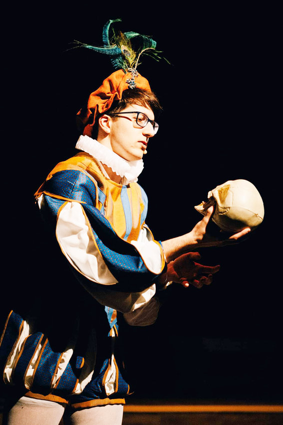 Kaden Kiwan plays Young Hamlet reciting lines in a play in The Book of Will, presented by Pittsburg Community Theatre.