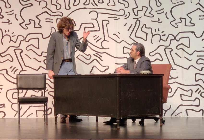 Character Ned Weeks, played by Bryce Presley, left, fights with his homophobic brother Ben Weeks, played by Westin Friederich in the PSU production of The Normal Heart at Memorial Auditorium.