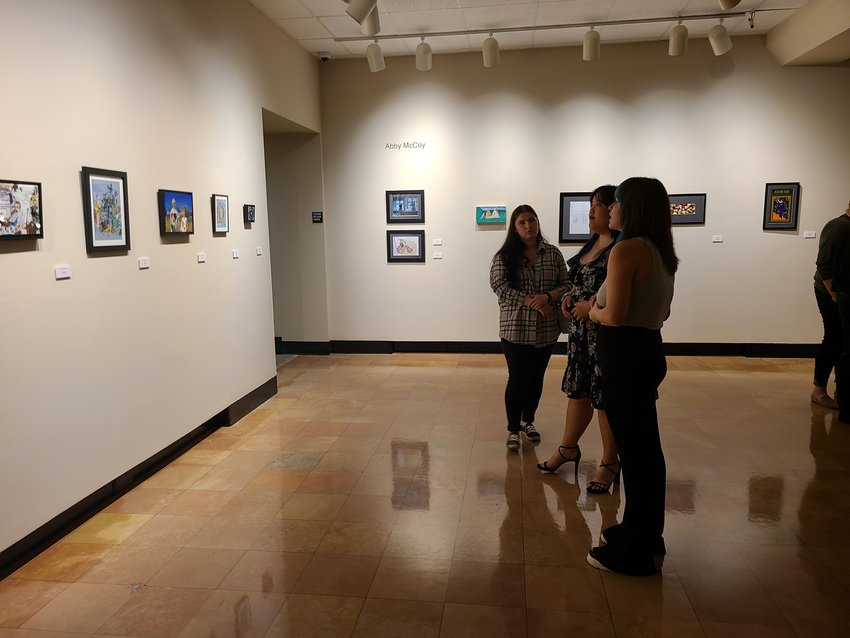 About 30 people attended the artists&rsquo; reception Friday for the Pittsburg State University Art Department&rsquo;s senior exhibition, called Sensory 22.