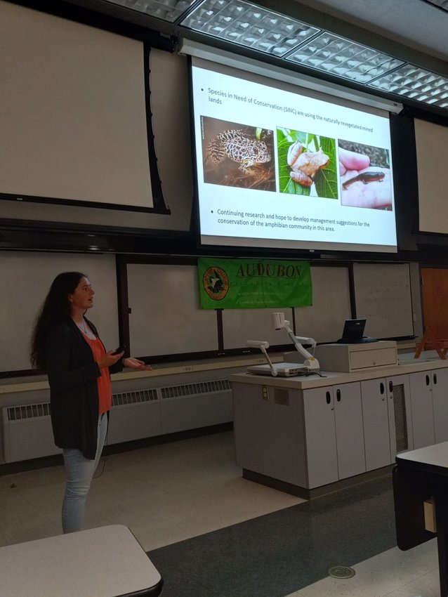 Emma Buckardt discusses some of the amphibian species found in the Mined Land Wildlife Areas of Southeast Kansas at the Sperry-Galligar Audubon Society&rsquo;s April meeting on Thursday on the Pittsburg State University campus. Another speaker, Luke Headings, discussed bird populations in the MLWA.