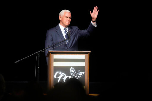 FILE - Former Vice President Mike Pence speaks at a fundraiser for Carolina Pregnancy Center on Thursday, May 5, 2022, in Spartanburg, S.C. Pence will campaign with Georgia's incumbent Republican Gov. Brian Kemp the day before this month's GOP primary in his most significant political beak with former President Donald Trump to date. (AP Photo/Meg Kinnard, File)