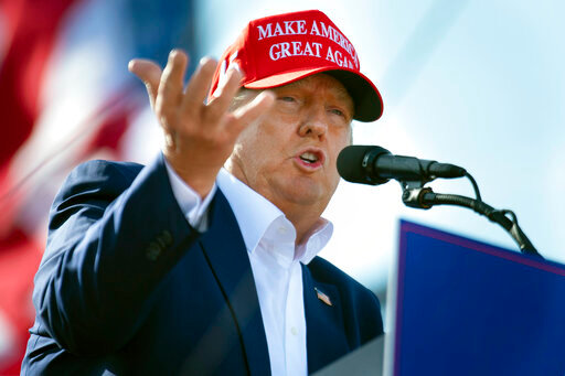 FILE &mdash; Former President Donald Trump speaks from the podium during a campaign rally, May 1, 2022, in Greenwood, Neb. A lawyer for the New York attorney general's office said Friday, May 13, 2022, that the office is &quot;nearing the end&quot; of its three-year investigation into Trump and his business practices. (Kenneth Ferriera/Lincoln Journal Star via AP, File)