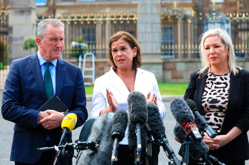 Sinn Fein's Conor Murphy, left, party leader Mary Lou McDonald, center, and Michelle O'Neill speak to the media at Hillsborough Castle, Northern Ireland, Monday, May, 16, 2022. British Prime Minister Johnson said there would be &ldquo;a necessity to act&rdquo; if the EU doesn't agree to overhaul post-Brexit trade rules that he says are destabilizing Northern Ireland's delicate political balance. Johnson was holding private talks with the leaders of Northern Ireland's main political parties, urging them to get back to work. (AP Photo/Peter Morrison)