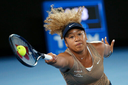 FILE - Naomi Osaka of Japan plays a forehand during their singles match against Andrea Petkovic of Germany at the Summer Set tennis tournament ahead of the Australian Open in Melbourne, Australia, Friday, Jan. 7, 2022. Osaka is a four-time Grand Slam champion who helped spark a conversation about athletes&rsquo; mental health when she pulled out of last year&rsquo;s French Open before her second-round match and revealed that she has dealt with anxiety and depression. (AP Photo/Hamish Blair, File)