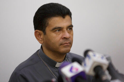 FILE - Rolando Alvarez, Bishop of Matagalpa, attends a press conference regarding the Roman Catholic Church's agreeing to act as &quot;mediator and witness&quot; in a national dialogue between members of civil society and the government in Managua, Nicaragua, May 3, 2018.  Alvarez began an &ldquo;indefinite fast&rdquo; Friday, May 20, 2022 inside a church to protest increasing harassment from national police, who he said followed him throughout the entire previous day. (AP Photo/Moises Castillo, File)