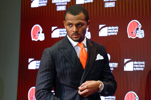 FILE - Cleveland Browns new quarterback Deshaun Watson enters a news conference at the NFL football team's training facility, on March 25, 2022, in Berea, Ohio. Two of the women accusing quarterback Deshaun Watson of sexual misconduct during massage therapy sessions feel offended by the $230 million contract he received from the Cleveland Browns. (AP Photo/Ron Schwane, File)