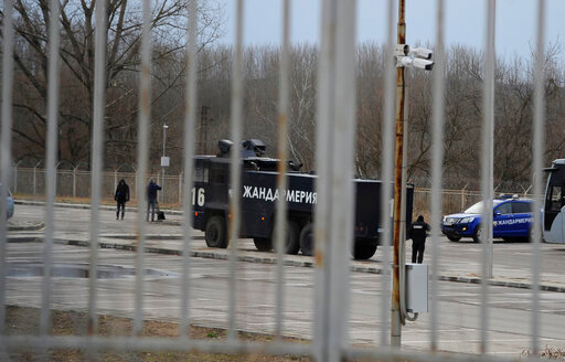 FILE - A water cannon truck is seen at the Kapitan Andreevo border crossing point between Bulgaria and Turkey on Saturday, Feb. 29, 2020. An international rights group says that Bulgarian authorities are attacking Afghan and other asylum-seekers, using police dogs and other violence to illegally push them back over the border into Turkey. Human Rights Watch said Thursday, May 26, 2022 that the migrants reported being beaten, robbed and stripped.  (AP Photo/Hristo Rusev, File)