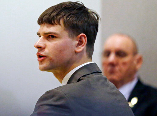 FILE - Nathan Carman, accused by family members of killing his millionaire grandfather and possibly his mother in an attempt to collect inheritance money, speaks during a probate hearing in district court in Concord, N.H., April 3, 2018. Nearly six years after Carman told authorities his mother drowned at sea off the coast of New England, he has been indicted in her killing. (AP Photo/Elise Amendola, Pool, File)