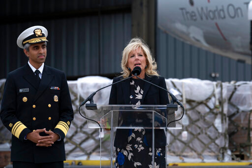 First lady Jill Biden speaks after a Fedex cargo plane arrived with 100,000 pounds of baby formula at Washington Dulles International Airport, in Chantilly, Va., on Wednesday, May 25, 2022. (AP Photo/Jose Luis Magana)