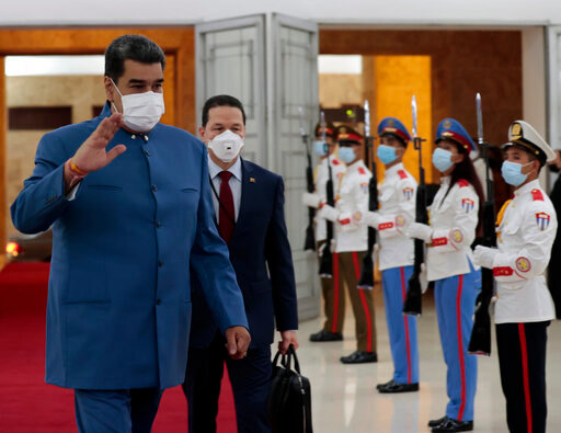 Venezuela's President Nicolas Maduro arrives to Revolution Palace to attend the XXI ALBA Summit in Havana, Cuba, Friday, May 27, 2022. (Ernesto Mastrascusa/Pool Photo via AP)