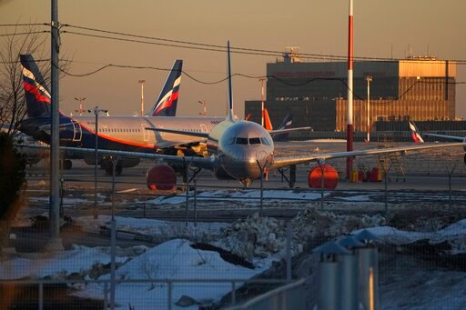 FILE - Aeroflot's passengers planes are parked at Sheremetyevo airport, outside Moscow, Russia, Tuesday, March 1, 2022. China has barred Russia&rsquo;s airlines from flying foreign-owned jetliners into its airspace, the Russian news outlet RBK reported, after President Vladimir Putin threw ownership of the planes into doubt by allowing them to be re-registered in Russia to avoid seizure under sanctions over Moscow&rsquo;s attack on Ukraine. (AP Photo/Pavel Golovkin, File)