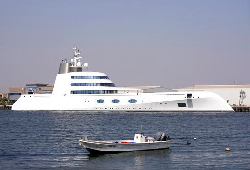The 118-meter (387-foot) Motor Yacht A belonging to  Russian oligarch Andrey Melnichenko is anchored in the port of Ras al-Khaimah, United Arab Emirates, Tuesday, May 31, 2022. In the dusty, northern-most sheikhdom of the United Arab Emirates, Motor Yacht A, one of the world's largest yachts, sits in the quiet port &mdash; so far avoiding the fate of other luxury vessels linked to sanctioned Russian oligarchs. (AP Photo/Kamran Jebreili)