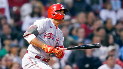Cincinnati Reds' Joey Votto watches his double during the fifth inning of the team's baseball game against the Boston Red Sox, Tuesday, May 31, 2022, at Fenway Park in Boston. (AP Photo/Charles Krupa)