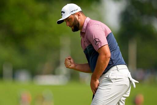 Jon Rahm, of Spain, celebrates after a putt on the 17th hole during the second round of the PGA Championship golf tournament at Southern Hills Country Club, Friday, May 20, 2022, in Tulsa, Okla. (AP Photo/Eric Gay)