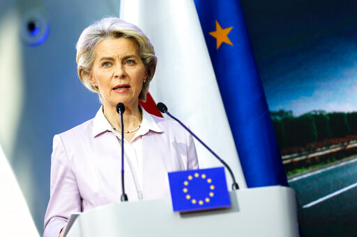 European Commission President Ursula von der Leyen briefs the media during a joint news conference with Polish President Andrzej Duda and Poland's Prime Minister Mateusz Morawiecki at the headquarters of Poland's Power Grid in Konstancin-Jeziorna, Poland, Thursday, June 2, 2022. The independence of Poland's courts is at the heart of a dispute with the European Union, which has withheld billions of euros in pandemic recovery funds. European Commission President Ursula von der Leyen meets Poland's leaders discuss the matter. (AP Photo/Michal Dyjuk)