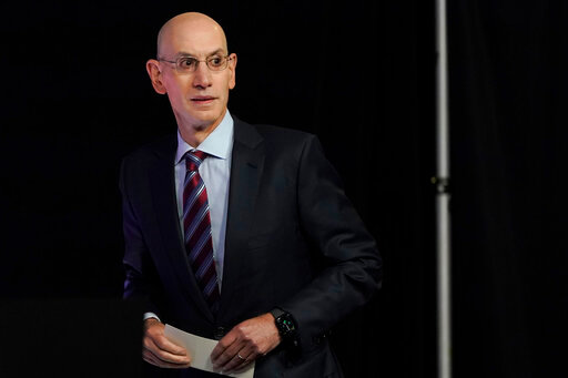 NBA Commissioner Adam Silver arrives at a news conference before Game 1 of basketball's NBA Finals between the Golden State Warriors and the Boston Celtics in San Francisco, Thursday, June 2, 2022. (AP Photo/Jeff Chiu)
