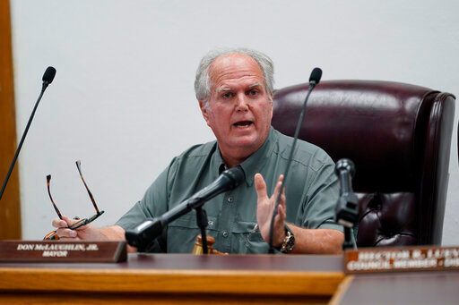 Uvalde Mayor Don McLaughlin, Jr., speaks during a special emergency city council meeting, Tuesday, June 7, 2022, in Uvalde, Texas, to reissue the mayor's declaration of a local state of disaster due to the recent school shooting at Robb Elementary School. Two teachers and 19 students were killed. (AP Photo/Eric Gay)