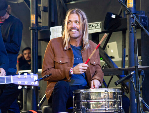 FILE - Musician Taylor Hawkins appears at One Love Malibu in Calabasas, Calif., on Dec. 2, 2018. Foo Fighters will honor the rock band&rsquo;s late drummer Taylor Hawkins with a pair of tribute concerts in September &mdash; one in London and the other in Los Angeles. The twin shows will take place Sept. 3 at London&rsquo;s Wembley Stadium and Sept. 27 at The Kia Forum in Los Angeles. Hawkins died March 25, 2022, during a South American tour with the rock band. He was 50. (Photo by Amy Harris/Invision/AP, File)