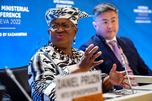 Director-General of the World Trade Organisation (WTO) Ngozi Okonjo-Iweala, left, and Timur Suleimenov, Chair of the 12th Ministerial Conference attend a press conference before the opening of the 12th Ministerial Conference at the headquarters of the World Trade Organization (WTO), in Geneva, Switzerland, Sunday, June 12, 2022. For the first time in 4 1/2 years, after a pandemic pause, government ministers from WTO countries will gather for four days starting Sunday to tackle issues like overfishing of the seas, COVID-19 vaccines for the developing world and food security. (Martial Trezzini/Keystone via AP)