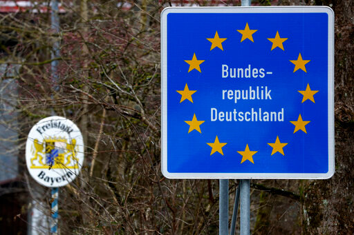 FILE - A German border sign stands at the Austrian-German border in Sachrang, Germany, Thursday, Dec. 10, 2020. Germany says it will temporarily introduce some border controls as the country gets ready to host the Group of Seven summit later this month in the Bavarian Alps. The country&rsquo;s interior ministry said in a statement Saturday, June 11, 2022 that it will increase border security from June 13-July 3. (AP Photo/Matthias Schrader, File )