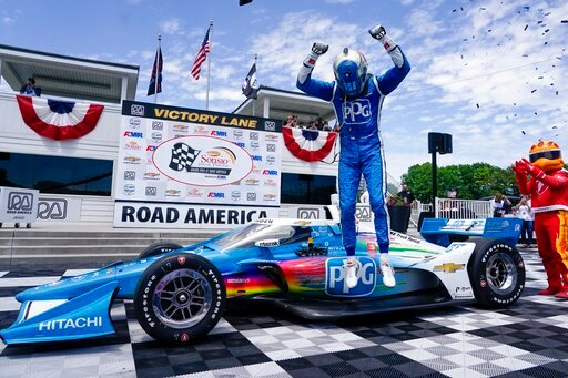 Josef Newgarden reacts after winning the Sonsio Grand Prix, Sunday, June 12, 2022, in Elkhart Lake, Wis. (AP Photo/Morry Gash)