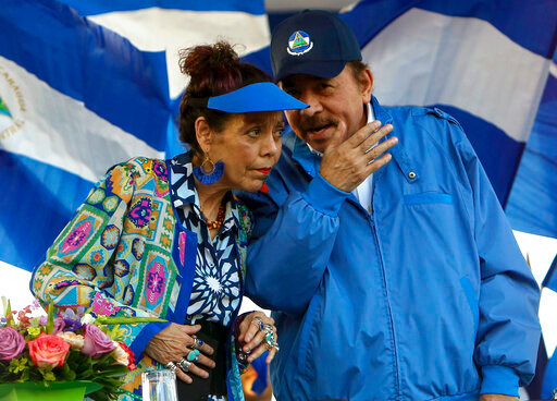 FILE - In this Sept. 5, 2018 file photo, Nicaragua's President Daniel Ortega and his wife and Vice President Rosario Murillo, lead a rally in Managua, Nicaragua. Nicaragua&rsquo;s Sandinista-controlled congress has cancelled nearly 200 nongovernmental organizations this last week of May 2022, ranging from a local equestrian center to the 94-year-old Nicaraguan Academy of Letters, in what critics say is President Daniel Ortega&rsquo;s attempt to eliminate the country&rsquo;s civil society. (AP Photo/Alfredo Zuniga, File)